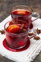 Winter hot drink with fruits and spices. Selective focus.