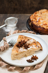Piece of handmade apple pie. Selective focus.