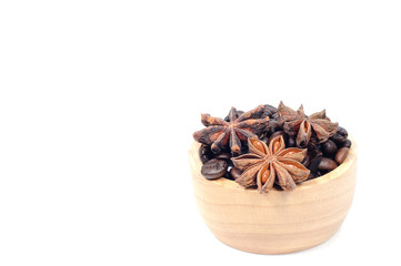 Chinese star aniseed Cinnamon and Coffee seeds on white backgrou