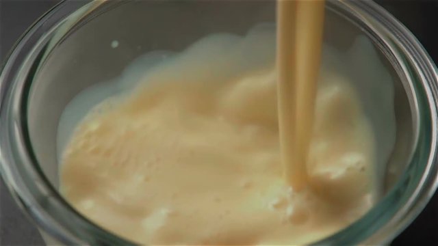 Slow motion of flan cooking. Find similar in our portfolio.