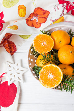 Tangerines and Christmas decorations