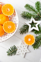Tangerines and Christmas decorations