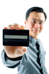 Businessman holding credit card