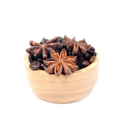 Chinese star aniseed Cinnamon and Coffee seeds on white backgrou