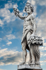 Ancient gods with grapes and horn of plenty