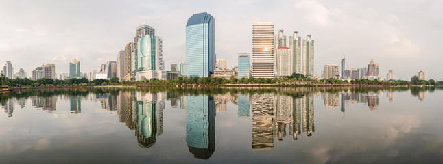 Fototapeta na wymiar Panorama of Bangkok city with park with reflection of skyline, Bangkok, Thailand.