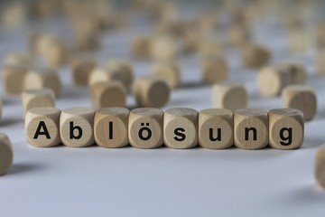 Ablösung - Holzwürfel mit Buchstaben