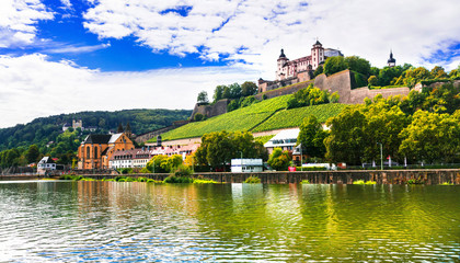 Fototapeta na wymiar Beautiful towns of Germany - Wurzburg, view with vineyrds and castle over Main river