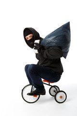 Burglar coming on children's bike