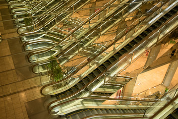 Infinite mirrored escalator at shopping mall in Tokyo, Japan