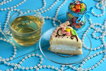 piece of cake and cup tea at the grand table