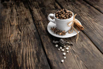 Coffee trio - coffee beans, cinnamon and star anise 
