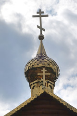 Symbol of faith. Iron Cross on church