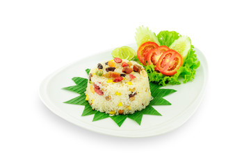 Rice with vegetables and fruit in white plate isolated