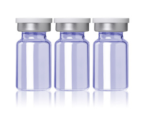 three blue little glass bottle
