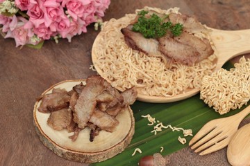 Instant noodles at blanched with baked pork delicious.