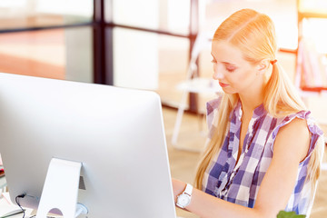 Young woman working in office