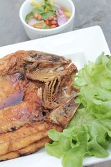Fried snapper with fish sauce and spicy salad.