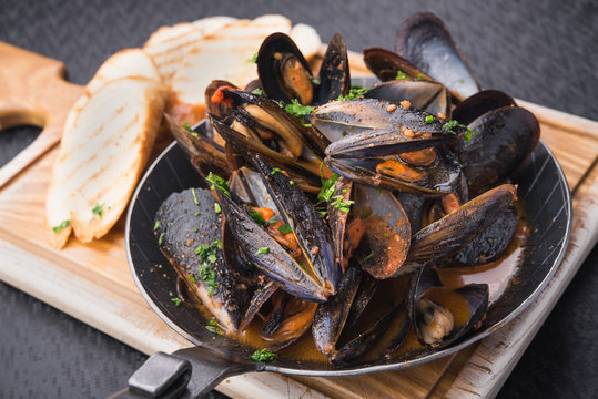 tasty mussels in pan