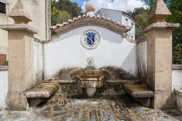 Fototapeta na wymiar Small water fountain