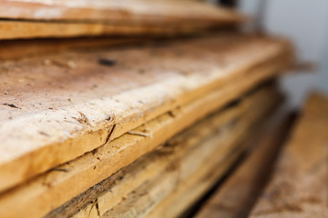 Large stack of wood planks
