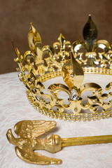 Scepter and crown on pillow