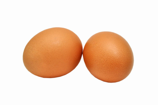 Two eggs on white background