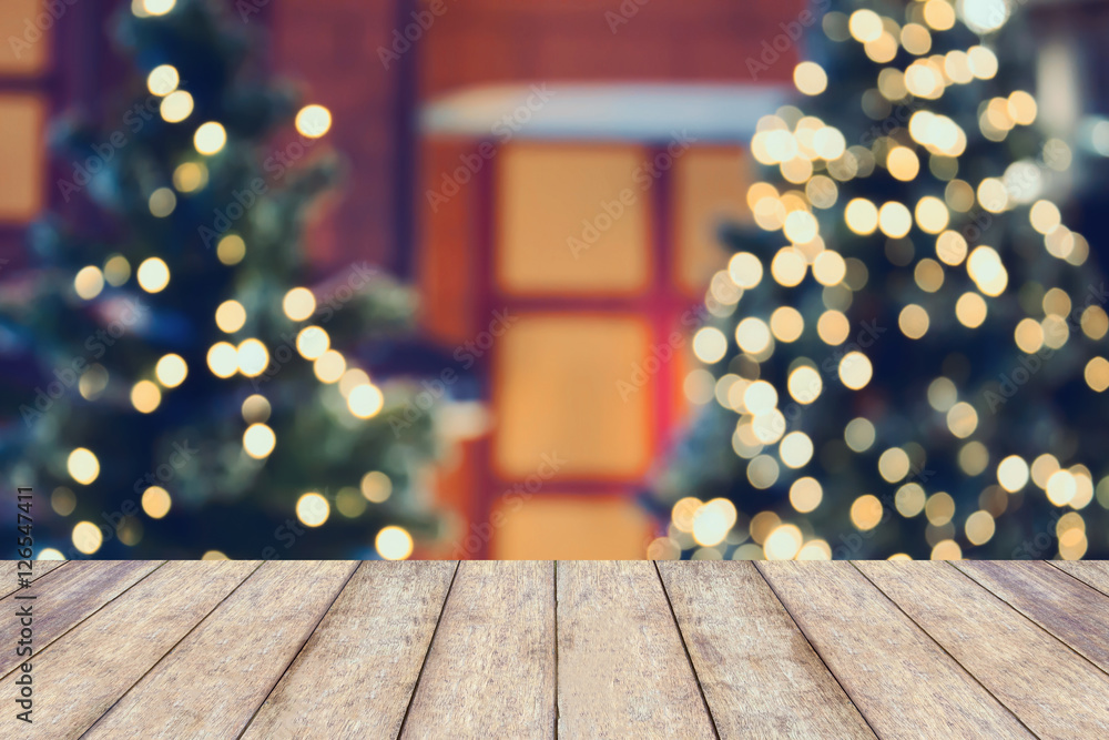 Wall mural Christmas holiday background with empty wooden table