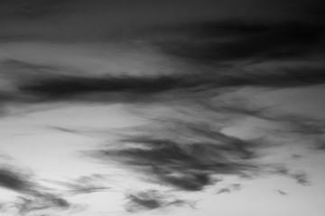 Fototapeta na wymiar Simple black and white clouds background