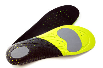 Orthopedic insoles for athletic shoes