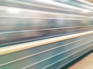 Fototapeta na wymiar Diagonal motion blur metro train background