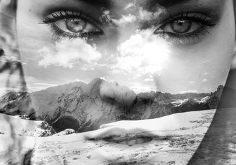 Monochrome double exposure of closeup girl portrait and mountainscape