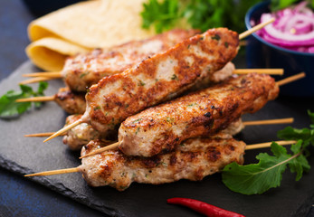 Minced Lula kebab grilled turkey (chicken) with vegetables.
