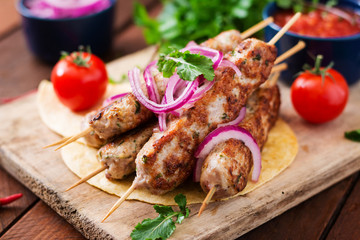 Minced Lula kebab grilled turkey (chicken) with vegetables.