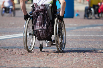 Disabled man rides a wheelchair