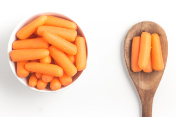 Mini Carrots Into a Bowl
