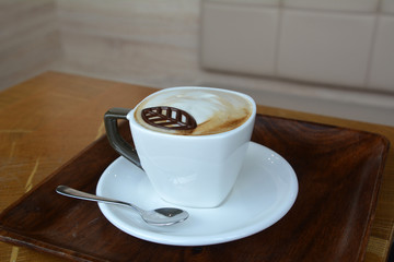 Delicious Foamy Italian Cappuccino On A Cup On A Table