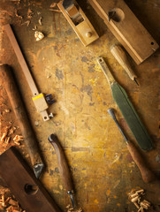 Hand tools Wood on an old wooden workbench