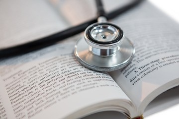 Stethoscope on open book
