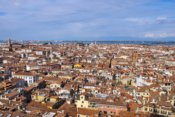 Fototapeta premium Venice aerial cityscape view with red tile roofs from San Marco Campanile. Venice, Italy.