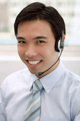 Businessman with headset on