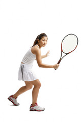 Fototapeta na wymiar Young woman playing tennis