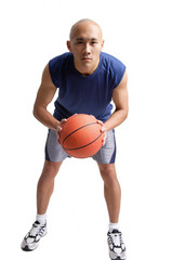Young man holding basketball