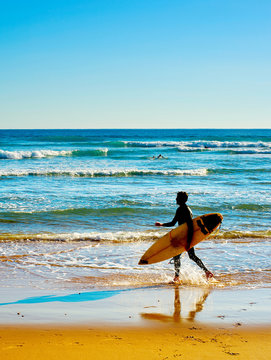 Surfer on a beach