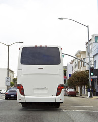 Rear View Tour Bus in Traffic