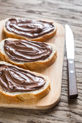 Slices of baguette with chocolate cream