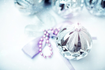 Purple and silver xmas decoration with copy space