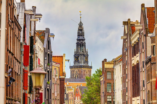 Cityscape of the Oudezijds kolk in Amsterdam, the Netherlands, with the Oude Kerk (old church) in the background, HDR Image