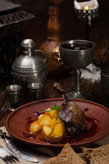 Roast leg of duck with peaches in own juice