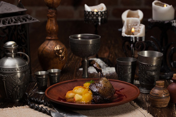 Roast leg of duck with peaches in own juice